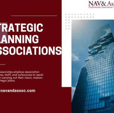 ### Key Elements

- **Main Subjects**: A modern skyscraper and a professional association management firm.
- **Objects**: The building represents corporate success and professionalism.
- **Notable Features**: The sleek, glass facade of the skyscraper contrasts with the bold text and color scheme in the background.
- **Text/Symbols**: The logo of NAV & Associates, along with a tagline about strategic planning associations and a website link.

### Overall Mood/Theme
The image conveys a sense of professionalism and modernity, highlighting the role of NAV & Associates in helping organizations achieve their strategic goals. The combination of architectural imagery and corporate messaging creates an atmosphere of ambition and forward-thinking.